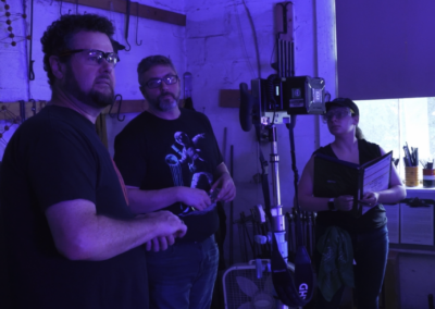 Cerebral Lounge CEO Lee Konen and Senior Producer Lauren Schild look over a shot setup.